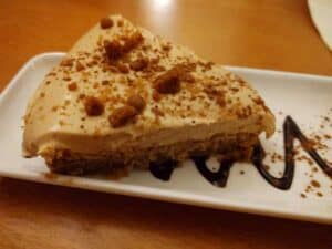 A plate of Abbie's homemade lotus biscoff cheesecake.